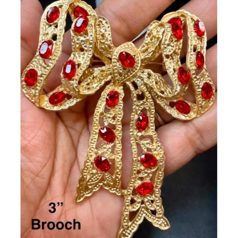 Ornate Filigree Red Gemstone Bow Brooch